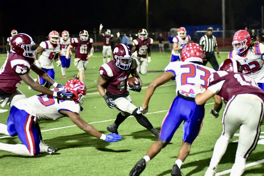 November 17, 2023: Darrell Smith of the Maroon Tide carries for a Picayune gain against Pascagoula last season.