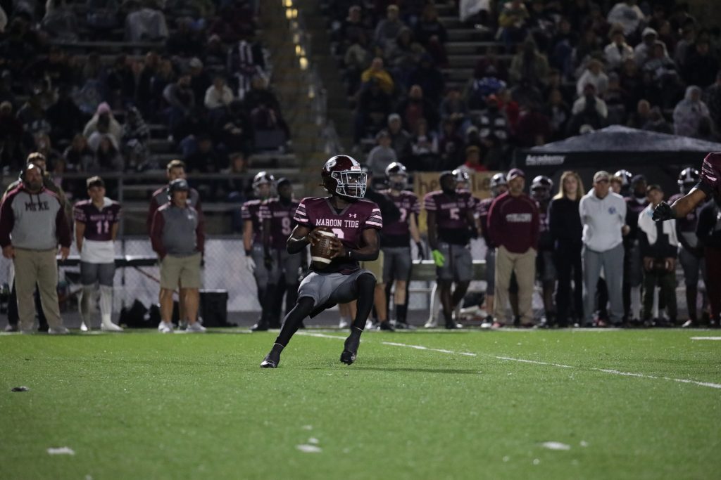 Tide QB Brandon Parker drops back to pass.